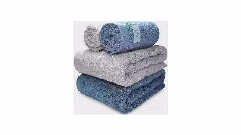 Qual a Melhor Toalha de Banho Gigante e Macia? Guia de Gramatura e Absorção